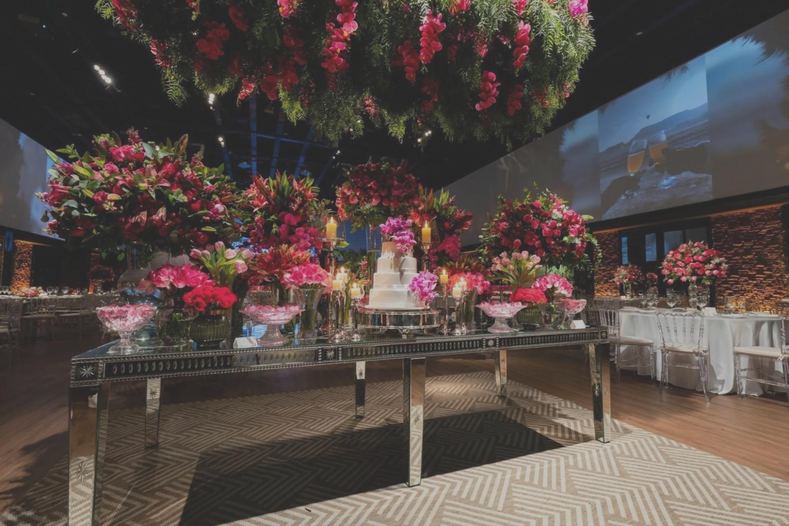 Professional floral arrangement being created on-site at an event venue